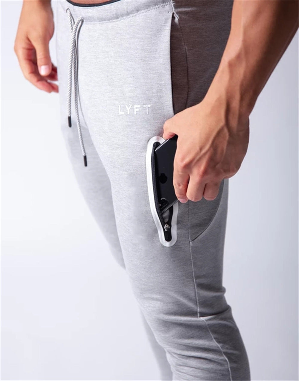 2019 Men's Sports Pants Men's Slim-Fit Elastic Invisible Zipper Casual Pants Stretch Cotton Foot-Retaining Pants Men's