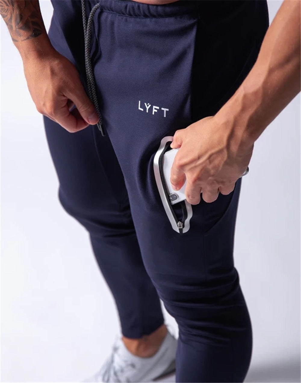 2019 Men's Sports Pants Men's Slim-Fit Elastic Invisible Zipper Casual Pants Stretch Cotton Foot-Retaining Pants Men's