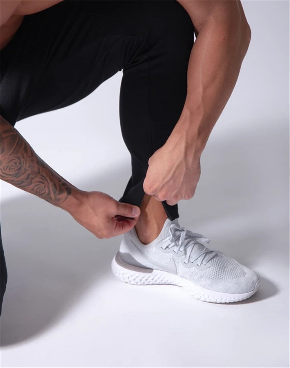 2019 Men's Sports Pants Men's Slim-Fit Elastic Invisible Zipper Casual Pants Stretch Cotton Foot-Retaining Pants Men's