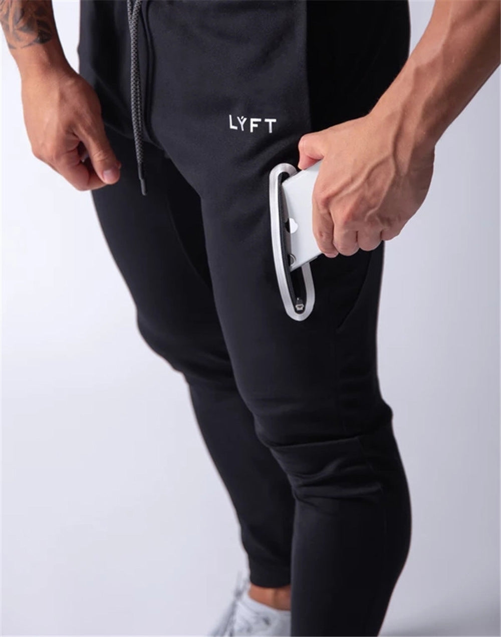 2019 Men's Sports Pants Men's Slim-Fit Elastic Invisible Zipper Casual Pants Stretch Cotton Foot-Retaining Pants Men's