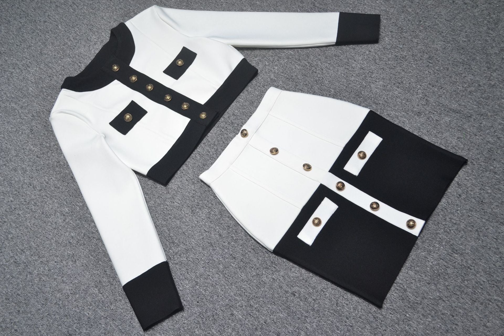 Cross-border 2020 Europe and the United States new temperament black and white color matching breasted cardigan A- line skirt suit factory wholesale 4 colors